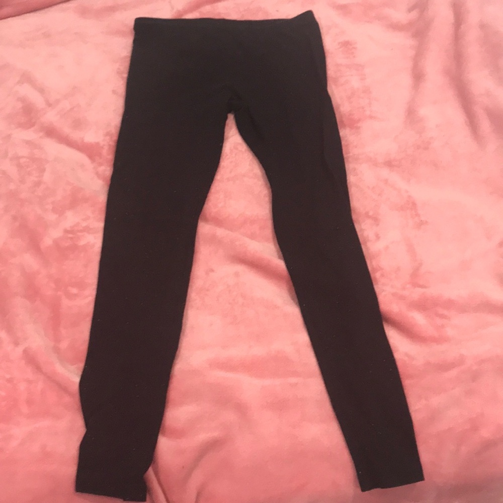 Black children’s leggings with fun rainbow detail